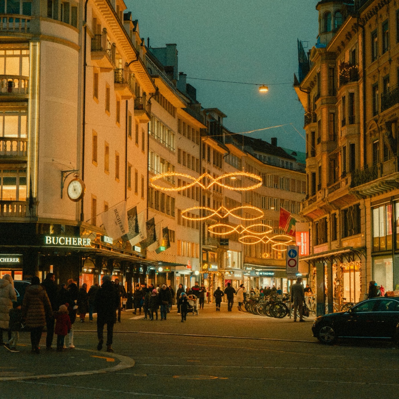 Shopping street with Christmas lights at dusk